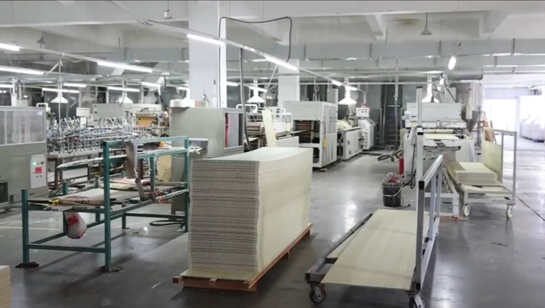 PVC building-material production line inside the Home Plus factory