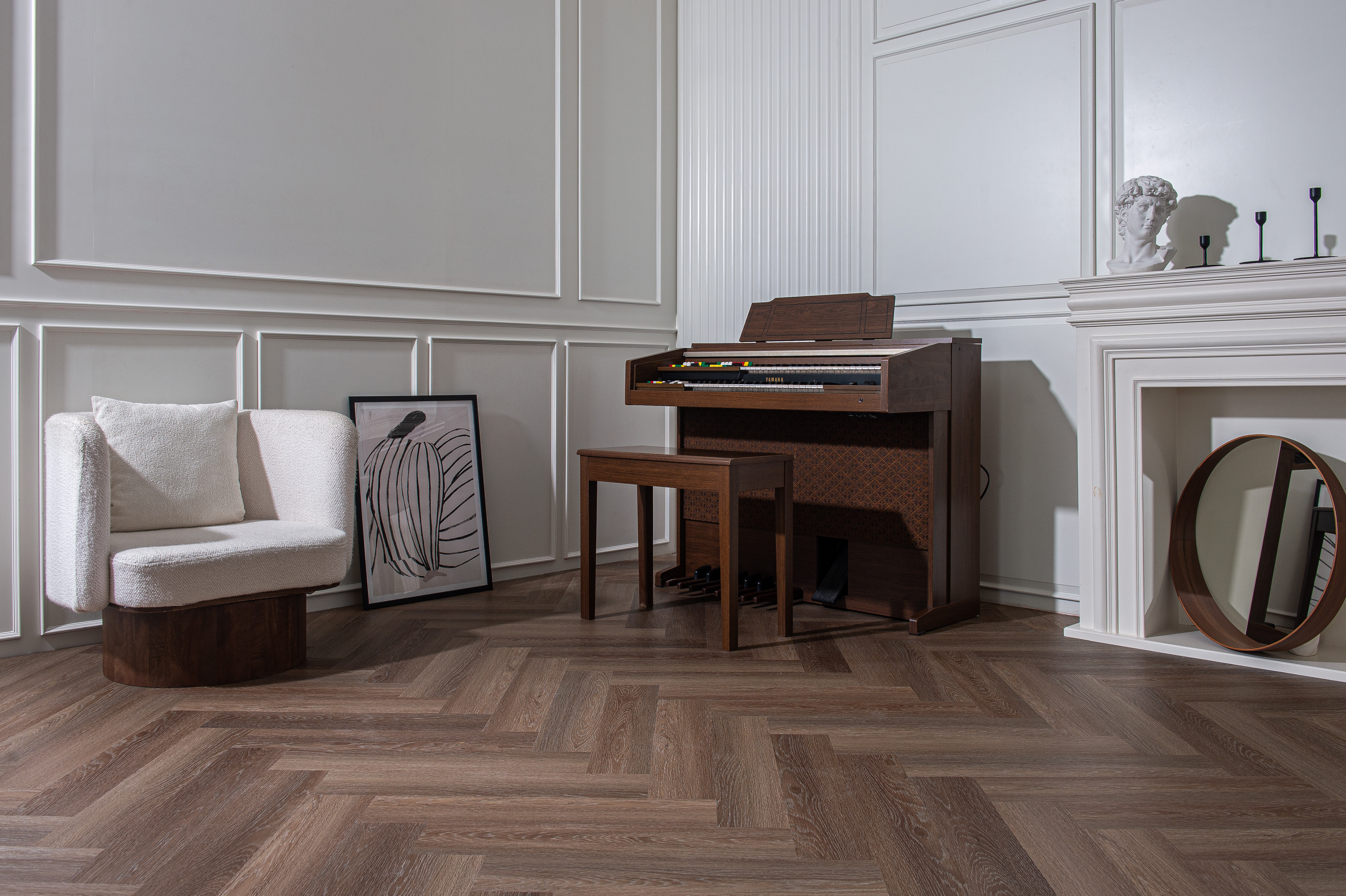 Dark Herringbone Application Warm wood-grain SPC flooring in a classic interior by Home Plus Materials